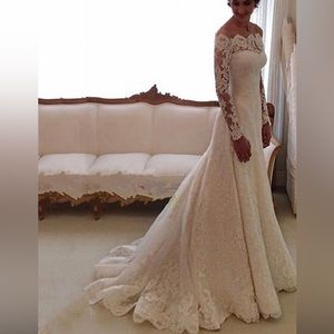 Stunning off the shoulder wedding dress from bridal boutique, vanilla white!